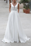 V‑Neck Satin A‑Line Wedding Dress With Pockets & Beaded Sash